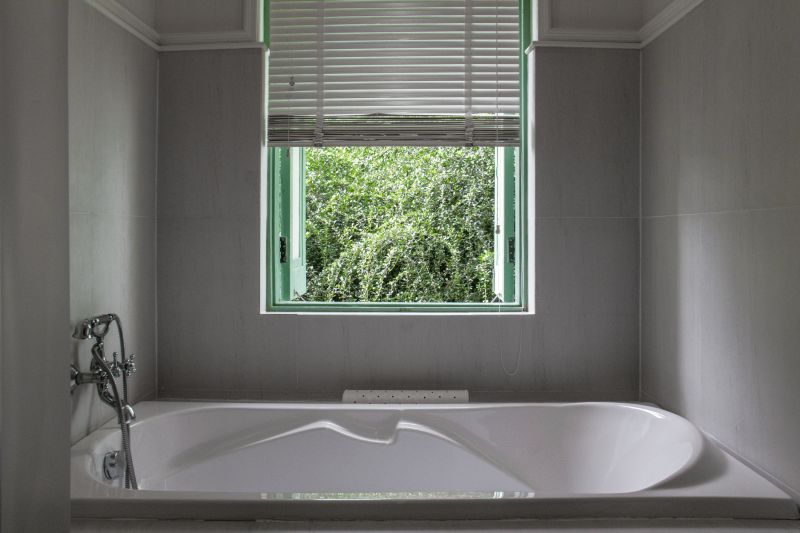 Fiberglass Tub with Modern Fixtures